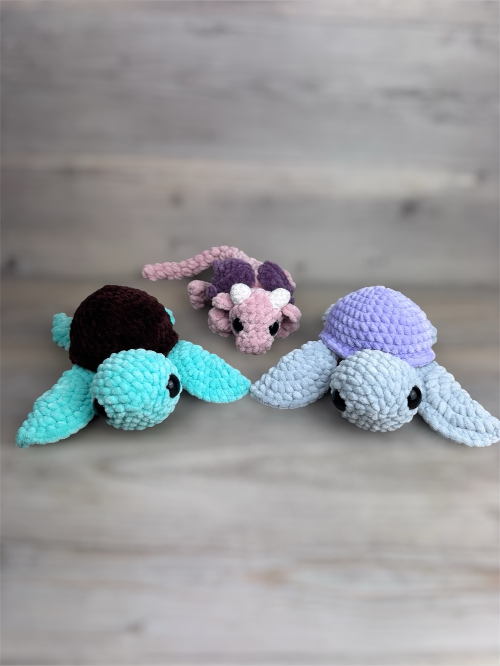 Crochet pink dragon and 2 turtle crochet 
Plush Excellent preowned condition